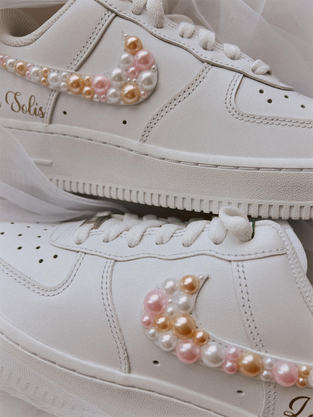 Custom personalized wedding sneakers for bride featuring pearls and elegant bridal design