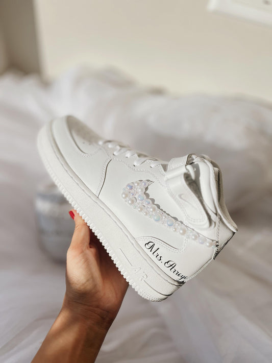 White pearl-embellished bridal sneakers designed for a wedding day look