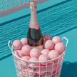 Custom tennis balls styled for a sports-themed wedding favor display