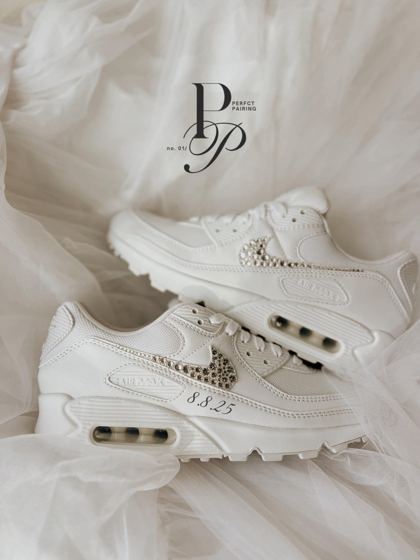 Close-up of hand-applied rhinestones on custom Air Max 90 wedding sneakers crafted for brides.