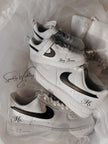Custom black and white Nike Air Force 1 groom wedding sneakers with hand-painted outer swooshes, personalized with wedding name and date
