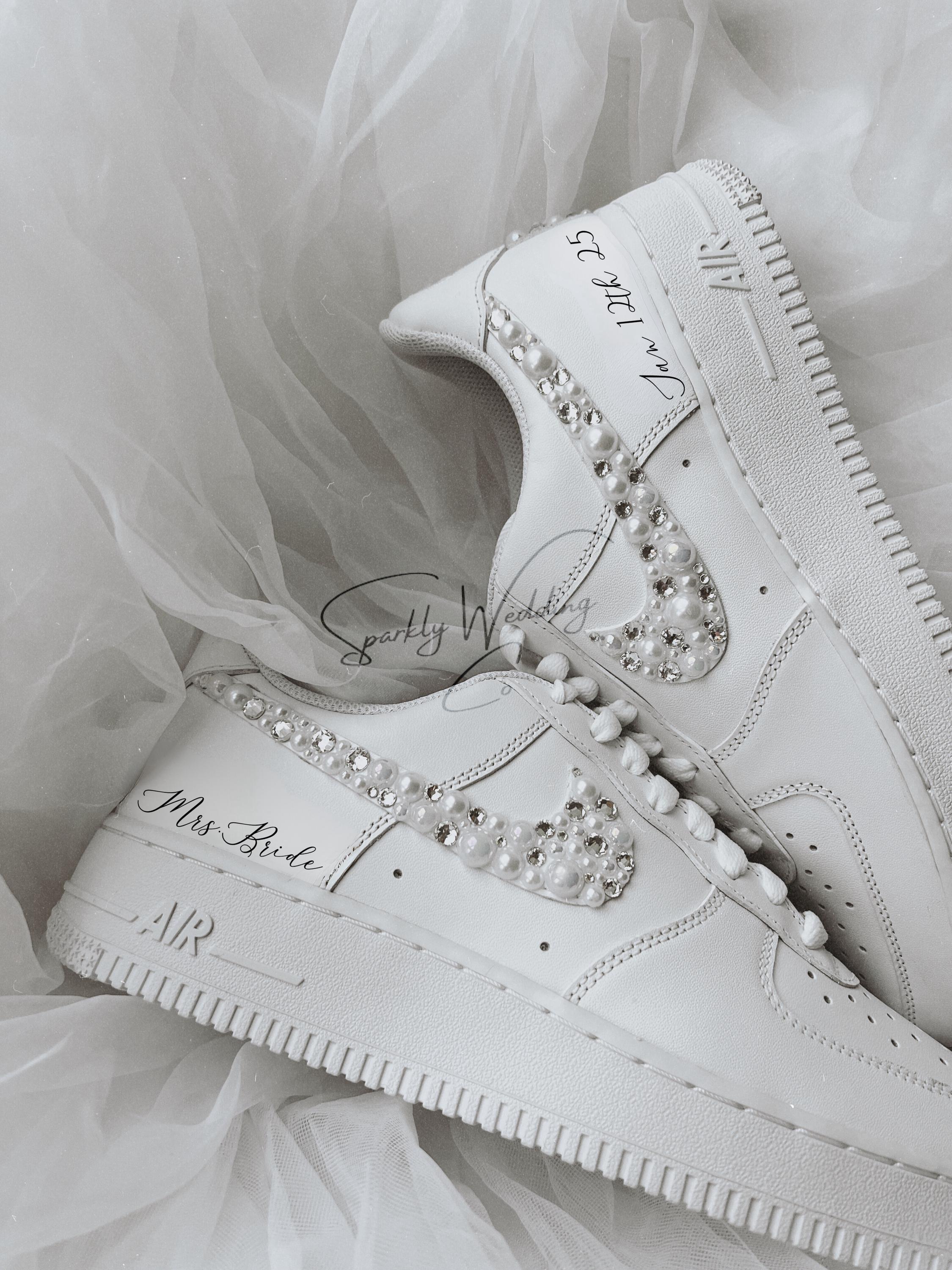 Custom bridal Nike Air Force 1 wedding sneakers with pearls and rhinestones on both outer swooshes and back, personalized with wedding name and date