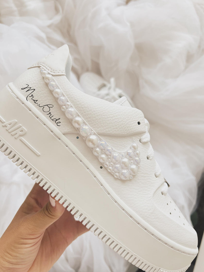 Custom Nike Air Force 1 Sage bridal wedding sneakers with rhinestones and pearls on the swoosh, 1.5 inch platform, personalized with wedding name and date