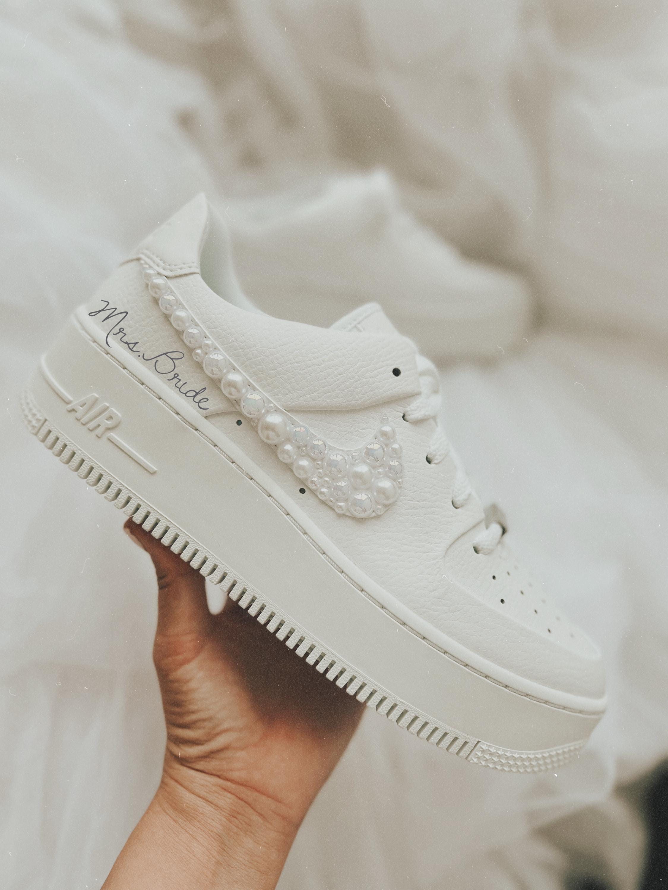 Custom Nike Air Force 1 Sage bridal wedding sneakers with rhinestones and pearls on the swoosh, 1.5 inch platform, personalized with wedding name and date