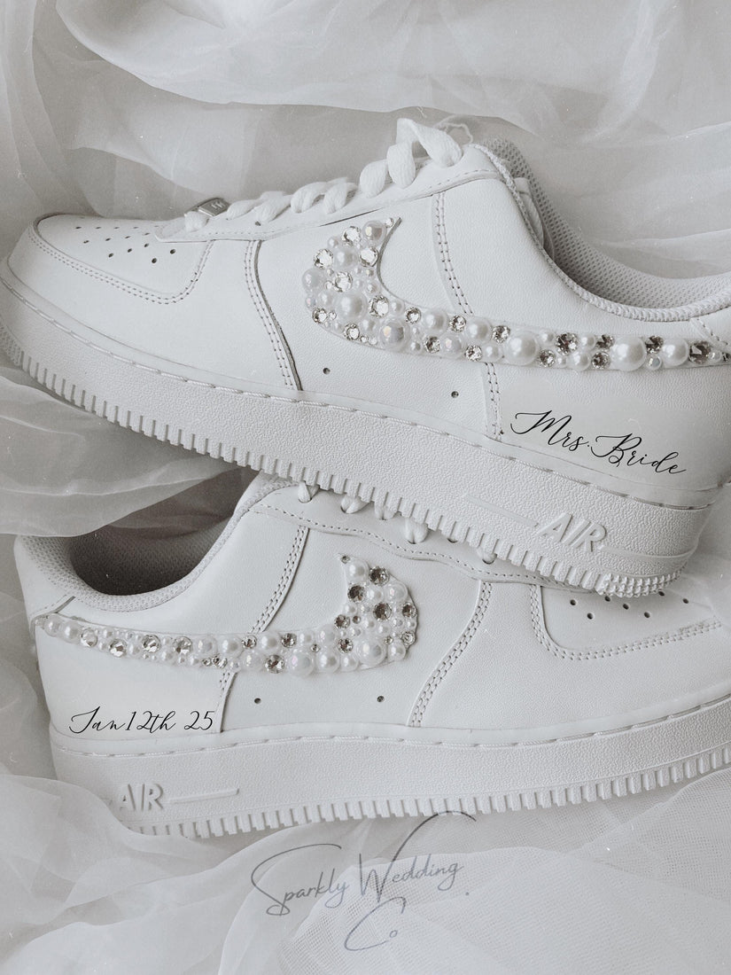 Custom bridal Nike Air Force 1 wedding sneakers with pearls and rhinestones on both outer swooshes and back, personalized with wedding name and date