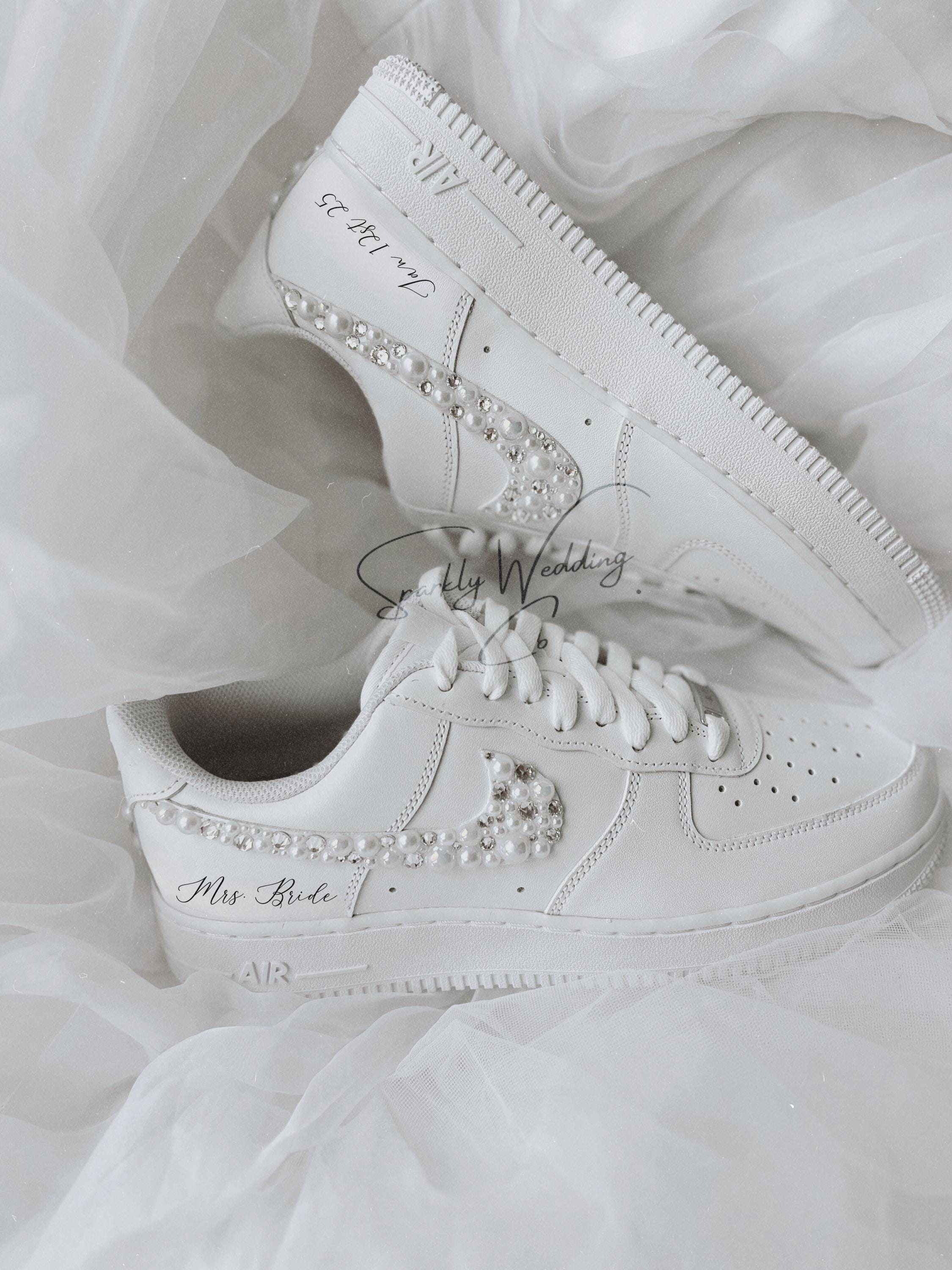 Custom bridal Nike Air Force 1 wedding sneakers with pearls and rhinestones on both outer swooshes and back, personalized with wedding name and date