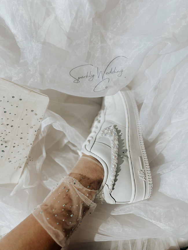 Personalized Nike Air Force 1 bridal wedding sneakers with pearls on both outer swooshes, customized with wedding name and date